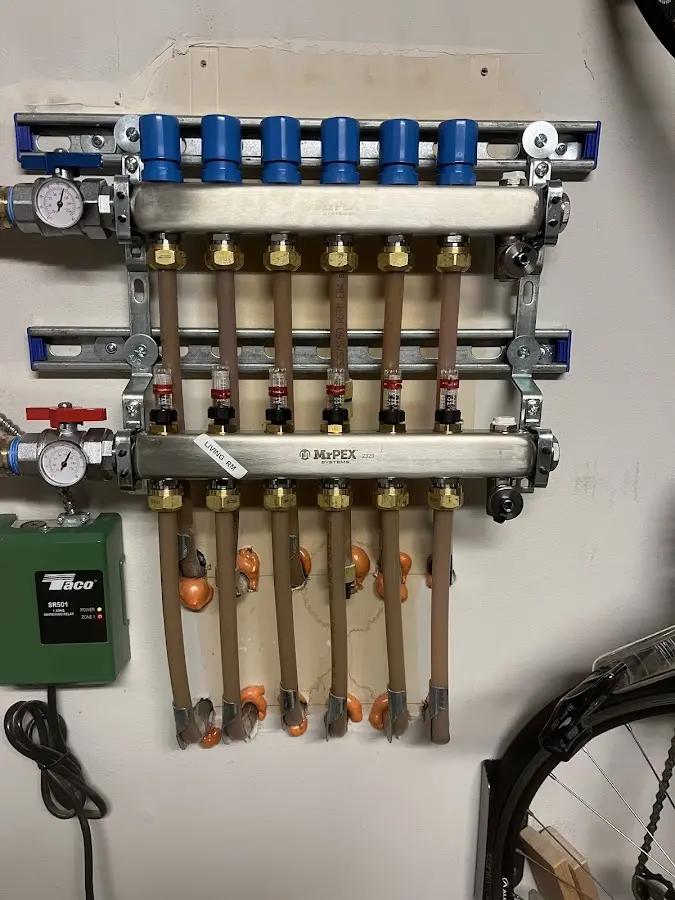 Plumber performing Gas Line Installation at a residential property in Deephaven